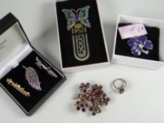 A hallmarked silver ring, costume jewellery brooches & a bookmark