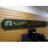 A vintage painted wooden Guinness advertising sign 'My Goodness, My Guinness', 300 x 39cms