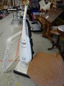 A Panasonic upright vacuum cleaner, clothes dryer & pouffe E/T