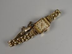 A Mithna 18ct gold ladies wristwatch