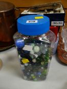 A sweet jar containing marbles