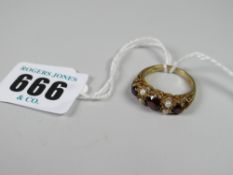 A 9ct gold garnet & pearl dress ring