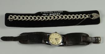 A hallmarked silver link bracelet together with a vintage Smiths Astral wristwatch