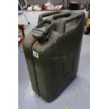 A vintage green military petrol can