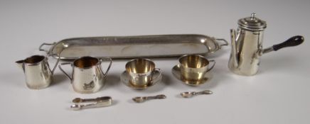 A RARE MINIATURE SILVER HOT-CHOCOLATE SET including conforming tray, tapered chocolate-pot, two cups