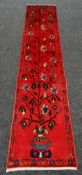 RED GROUND IRANIAN RUNNER floral design, 57 x 284cms