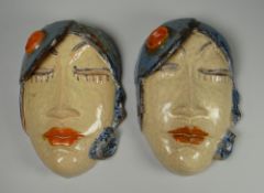 A PAIR OF KERAMOS ART DECO WALL MASKS in the style of Vally Wieselthier, modelled as a lady