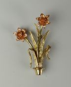 A CLOGAU DAFFODIL BROOCH in two tone, with case, outer box and tag