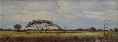 GERRIE SNYMAN oil on board - South African bush landscape, signed, 15 x 37cms