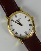 A GENT'S RAYMOND WEIL GOLD PLATED WRISTWATCH with wallet and papers, the white dial of oval form