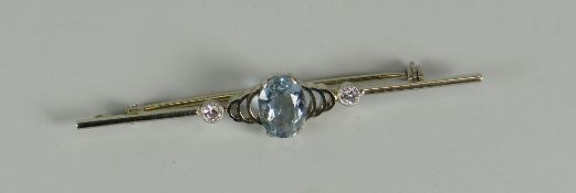 AN 18CT PLATINUM BAR BROOCH set with centre aquamarine stone and two outer diamonds, 3gms