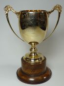 AN IMPORTANT HISTORIC GREYHOUND RACING CUP inscribed 'THE GLAMORGAN GOLD CUP 1932 PRESENTED BY