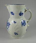 A DR. WALL PERIOD WORCESTER PORCELAIN MASK-HEAD JUG with cabbage-leaf and vertical moulding to the