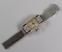 ART DECO 9ct WHITE GOLD LADIES COCKTAIL WATCH the face surround decorated with diamond chips & black