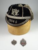 AN ASSOCIATION FOOTBALL CAP FOR FRANK ARNOLD & TWO FOOTBALL MEDALS the cap in excellent condition,