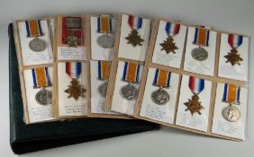 AN ALBUM OF MOSTLY WWI PERIOD MEDALS also to include WWII period medals detailing British armed