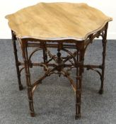 A MAHOGANY OCCASIONAL TABLE with a super architectural base & shaped top, 85cms diam