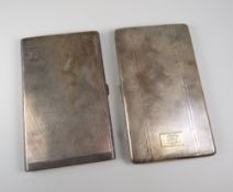 TWO SILVER CIGARETTE CASES both machine-turned with gilt interiors, one with monogrammed