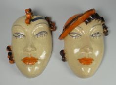 A PAIR OF WALL MASKS in the style of Vally Wieselthier, modelled as a lady wearing a beret and a