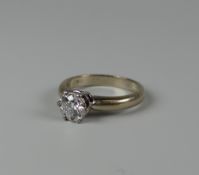 AN 18CT WHITE GOLD DIAMOND SOLITAIRE RING in six claw setting, visual estimate 0.6ct