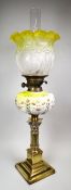 A GOOD ANTIQUE OIL LAMP composed of stepped and Corinthian column brass base, painted vaseline glass