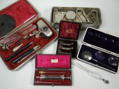 A PARCEL OF VINTAGE EAR, NOSE & THROAT MEDICAL INSTRUMENTS including a cased set of three