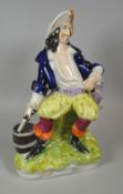 STAFFORDSHIRE MODEL 'WILL WATCH' with the smuggler seated with pistol, title in gilt to base,