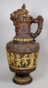 A GERMAN GOTHIC REVIVAL SALT-GLAZED POTTERY WINE EWER, circa 1880/1890 relief decorated all round