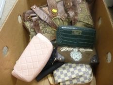 Box of designer purses and handbags
