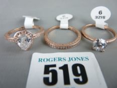 Three precious metal dress rings