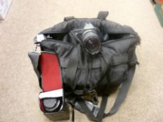 Camera bag with contents including assortment of lenses etc