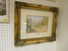 Gilt framed watercolour - alpine setting with figure to the foreground, monogrammed 'J E L', dated