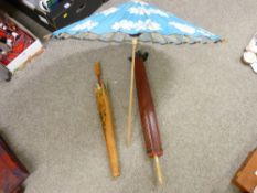 Three Oriental parasols