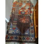 An old Baluchi rug, 130 x 90cms