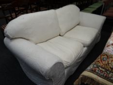 Loose covered sofa bed settee