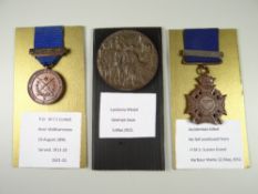TWO RIFLE & REVOLVER MEETING MEDALS with clasps, engraved to WCE Cordell R.N. together with
