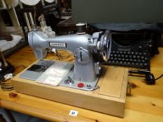 A vintage cased seamstress sewing machine