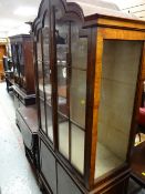 Mahogany dome-top display cabinet with two-door cupboard base