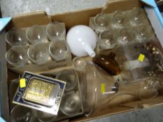 A box of mostly drinking glasses together with a few glass ornaments