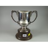 A silver sporting trophy inscribed 'The Lee Golf Club, North Devon Captain's Cup 1931' on a base