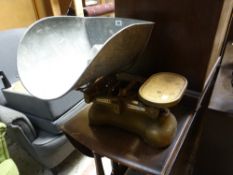 An Avery shop counter weighing scales & weights