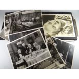 A photograph album containing many photographs pertaining to the cinema of Warner Bros etc