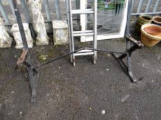 A cast metal garden bench frame (outside)