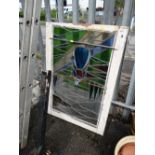 A leaded stain glass window panel (distressed) (outside)