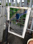 A leaded stain glass window panel (distressed) (outside)