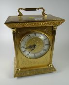 A large brass effect mantel clock