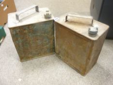 Two old petrol cans, one for Esso