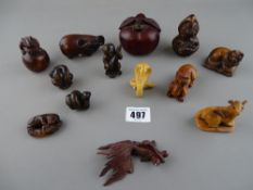 Contemporary collection of Oriental carved wood netsukes and animal figures etc