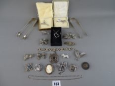 Antique and later marcasite set jewellery, stylized silver and Victorian brooches along with two