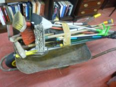 Parcel of long handled garden tools and a wheelbarrow etc